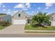 Beautiful home showcasing well-manicured lawn and inviting curb appeal at 3804 Tattenhall Drive Dr, Cumming, GA 30040