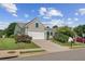 Charming home with a two-car garage and well-maintained landscaping at 3804 Tattenhall Drive Dr, Cumming, GA 30040