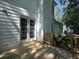 Backyard view from the wooden deck of this home, featuring bright white siding and beautiful french doors at 21 Queen Anne Se Dr, Mableton, GA 30126