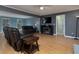 Comfortable living room featuring neutral paint colors, a ceiling fan, and hardwood floors at 21 Queen Anne Se Dr, Mableton, GA 30126