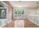 Bright open living room area with vaulted ceilings features ceramic tile flooring at 1180 Springs Dr, Canton, GA 30115