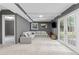 Finished basement offers a large seating area and French doors leading to the exterior at 431 Hickory Se Ln, Smyrna, GA 30082