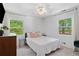 Bright bedroom features a window with natural light and neutral decor at 431 Hickory Se Ln, Smyrna, GA 30082