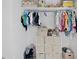 Closet with rod and shelf storage, and bins on the floor at 431 Hickory Se Ln, Smyrna, GA 30082