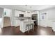 Bright kitchen with granite countertops, stainless steel appliances, and white cabinetry at 431 Hickory Se Ln, Smyrna, GA 30082