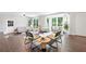 Sun-filled living room with large bay window, wood floors, and neutral decor at 431 Hickory Se Ln, Smyrna, GA 30082