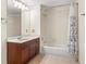Bathroom showcasing a tub with a shower, and a single vanity at 230 E Ponce De Leon Ave # 104, Decatur, GA 30030