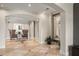 Elegant lobby with tile flooring, comfortable seating and interior architecture with arched walkways and large mirrors at 230 E Ponce De Leon Ave # 104, Decatur, GA 30030