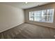 Bedroom features natural light, carpet, and neutral walls at 5455 Blossomwood Sw Trl, Mableton, GA 30126