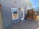 Deck with wood plank flooring, gray siding, and view to backyard at 5455 Blossomwood Sw Trl, Mableton, GA 30126