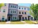 Exterior view of charming townhomes with well-kept lawns at 5455 Blossomwood Sw Trl, Mableton, GA 30126