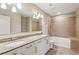 Bathroom with granite countertops, double sinks, and a shower-tub combination at 950 W Peachtree Nw St # 812, Atlanta, GA 30309