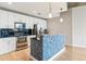 Modern kitchen features stainless steel appliances, stylish cabinets, and granite countertops at 950 W Peachtree Nw St # 812, Atlanta, GA 30309