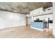 Open-concept living space with bright kitchen, offering stainless appliances and city views at 950 W Peachtree Nw St # 812, Atlanta, GA 30309