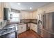 Bright kitchen boasting granite countertops and stainless steel appliances at 9805 Buice Rd, Alpharetta, GA 30022