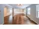 Open-concept living area featuring hardwood floors, recessed lighting, and seamless transitions to other rooms at 9805 Buice Rd, Alpharetta, GA 30022
