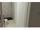 Stylish bathroom with white tile, black shower floor, and modern fixtures at 1092 Hillcrest Se Dr, Atlanta, GA 30316