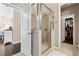 Bright bathroom featuring a glass shower and access to a large walk-in closet at 2520 Carmel Way, Alpharetta, GA 30009