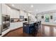 Spacious kitchen featuring a large island, stainless steel appliances, and hardwood floors at 2520 Carmel Way, Alpharetta, GA 30009