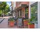 Street view of Academy Bar with outdoor seating, showcasing the local dining and a vibrant neighborhood at 2520 Carmel Way, Alpharetta, GA 30009