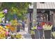 Quaint street view featuring Truck and Tap, outdoor dining, and vibrant foliage, highlighting the local commercial charm at 2520 Carmel Way, Alpharetta, GA 30009
