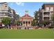 Lively town square featuring a historic building and splash fountain, highlighting the community's social and recreational space at 2520 Carmel Way, Alpharetta, GA 30009