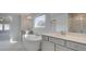 Elegant bathroom featuring a soaking tub, and a shower at 117 Compass Rd, Hampton, GA 30228