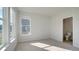 Bedroom with a window and a view into the bathroom at 117 Compass Rd, Hampton, GA 30228