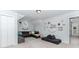 Comfortable bonus room with wall decor and plenty of space for relaxation and play at 2115 Bentbrooke Trl, Lawrenceville, GA 30043