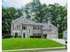 Beautiful two-story home with a well-manicured lawn, lush landscaping, and a two-car garage in a desirable neighborhood at 2115 Bentbrooke Trl, Lawrenceville, GA 30043