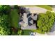 An aerial view of a house showcasing the roofline, driveway, and surrounding landscaping at 3737 Falls Trl, Winston, GA 30187