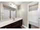Neutral bathroom with double doors and a shower/tub combo at 3737 Falls Trl, Winston, GA 30187