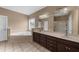 Primary bath featuring a jacuzzi soaking tub, tiled floor, and a double vanity at 3737 Falls Trl, Winston, GA 30187
