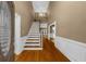 Welcoming foyer with hardwood floors, a grand staircase, and neutral wall colors at 3737 Falls Trl, Winston, GA 30187