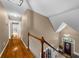 Elegant foyer with hardwood floors, natural light, and a welcoming staircase to upper floor at 3737 Falls Trl, Winston, GA 30187