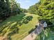 Scenic view of the golf course showcasing the lush green fairway and surrounding trees at 7198 Golfside Se Dr, Covington, GA 30014
