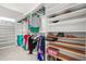 This closet has ample shelving and hanging space for organizing clothes and accessories at 2241 Chaseford Ln, Powder Springs, GA 30127