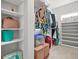 This walk-in closet has ample shelving and storage for shoes, clothes and accessories at 2241 Chaseford Ln, Powder Springs, GA 30127
