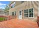 A view of a wooden deck extending from the house, offering an outdoor living space at 2241 Chaseford Ln, Powder Springs, GA 30127