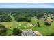 Breathtaking aerial view of golf course and surrounding lush greenery and neighborhood homes at 140 Silvermere, Fayetteville, GA 30215