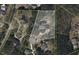 Aerial view of large lot, long driveway, established landscaping, backyard pool and quiet cul-de-sac at 140 Silvermere, Fayetteville, GA 30215