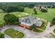 Aerial view of the clubhouse with golf course and surrounding community at 140 Silvermere, Fayetteville, GA 30215