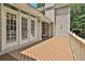 The property features a large wooden deck perfect for entertaining or relaxing outdoors at 140 Silvermere, Fayetteville, GA 30215