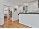 View of the elegant butler's pantry and a hallway with stairs leading to the second floor at 140 Silvermere, Fayetteville, GA 30215