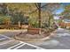 Community entrance features brick signage with lush landscaping and well-maintained grounds at 140 Silvermere, Fayetteville, GA 30215