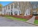 Exterior view of a large two story house with white columns and a brick porch at 140 Silvermere, Fayetteville, GA 30215