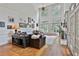 Spacious living room with a soaring ceiling, fireplace, and lots of natural light at 140 Silvermere, Fayetteville, GA 30215