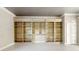 Bright bedroom featuring built-in shelving and decorative molding at 1806 Wynthrop Manor Sw Dr, Marietta, GA 30064