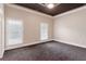 Spacious bedroom featuring two windows and neutral colored walls at 1806 Wynthrop Manor Sw Dr, Marietta, GA 30064