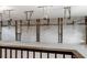 Spacious garage featuring multiple garage doors and industrial lighting at 1806 Wynthrop Manor Sw Dr, Marietta, GA 30064